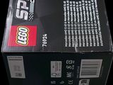 a box of legos sitting on a black surface