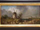 an oil painting of a windmill in a landscape with a man and a dog
