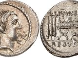 a silver coin with an image of a man on it