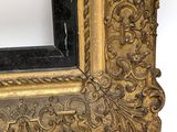 an image of a gold frame with a black border on a white background