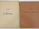 two books with writing on them sitting next to each other