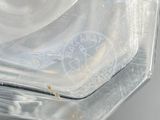 a plastic container that has some food inside of it