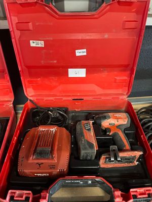 a red tool box with tools inside of it