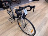 a bicycle that is sitting on the floor in a store