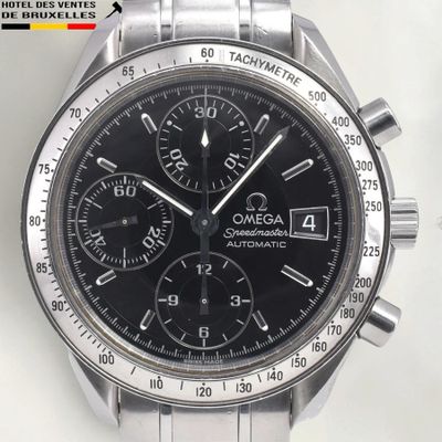 an image of a close up of a watch on a white surface
