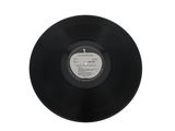 vinyl record on a white background with a black label