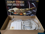 a cardboard box with a star trek set inside of it