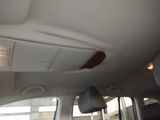 the interior of a car with the sun shining through the window
