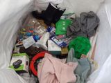 a bag full of clothes and other items in it