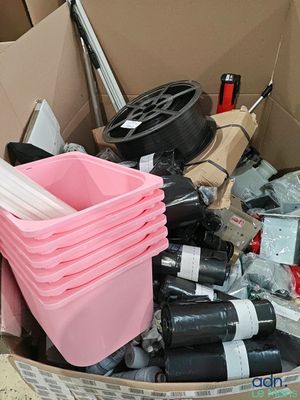 a box full of wine bottles and other items in it