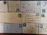 many old envelopes that are on a table