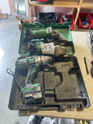 many tools that are sitting on a table in a garage