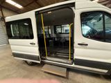 a white van with its doors open in a garage