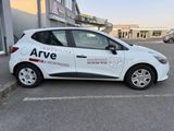 a white car that is parked in a parking lot