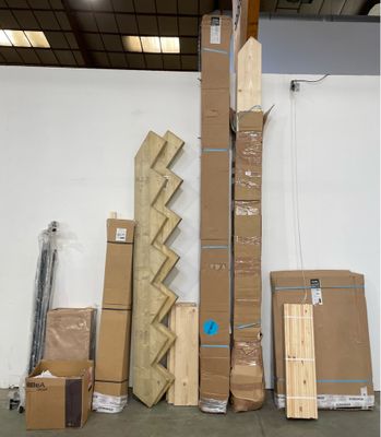 many cardboard boxes stacked on top of each other in a warehouse