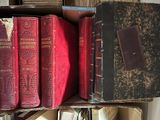 a lot of books that are sitting on a shelf