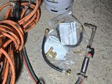 a bunch of hoses that are sitting on the floor
