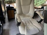 a chair that is sitting in front of a computer monitor