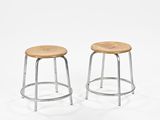 two metal stools with wooden seat on a white background
