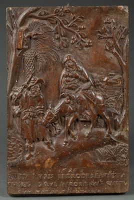 an image of a wooden plaque with a scene of a man and a woman in a forest