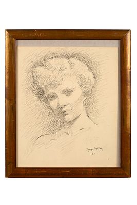 une image représentant le dessin du visage d'une femme dans un cadre en bois