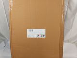 a cardboard box that is sitting on top of a white sheet