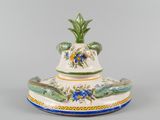 an image of a decorative vase with a pineapple on it