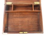 a small wooden box with two compartments inside of it