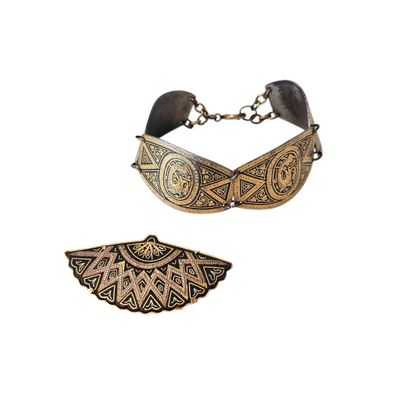 an image of two pieces of jewelry on a white background