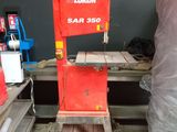 a machine that is sitting on a pallet in a room