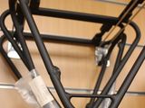a picture of a bicycle rack with wires attached to it