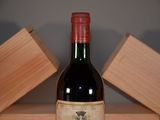 a bottle of wine that is sitting on a table