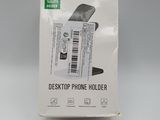 packaging of a white phone holder with a barcode on it