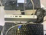 a keyboard and a mouse sitting on a desk next to each other