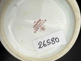 a close up of a bowl with a label on it