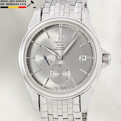 an image of a close up of a watch on a white surface