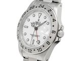 a close up of a wrist watch on a white background