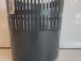 a trash can that is sitting on a counter