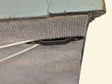 a piece of metal that has been torn off