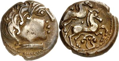 a silver coin with a horse on the front and a horse on the back