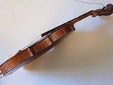 a violin that is sitting on a table