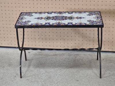 a small table with a blue and white pattern on it