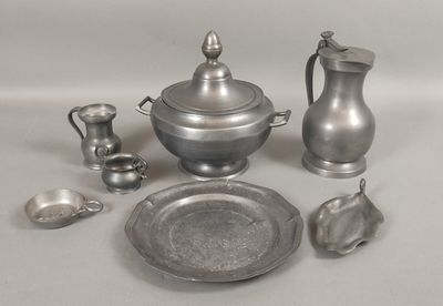 a lot of silver items that are on a table