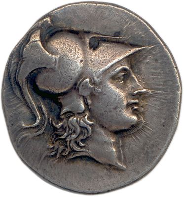 an image of a coin with a head of a man on it