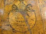 a close up of an old globe with a map on it