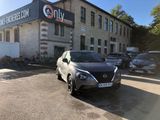 a car that is parked in front of a building