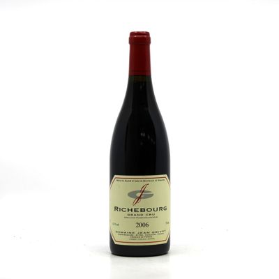 a bottle of wine that is sitting on a table