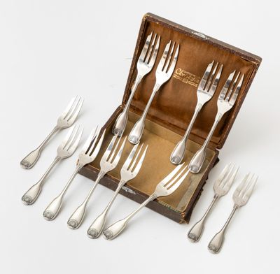 a set of six forks in a wooden box with silverware in it