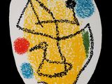a plate with a drawing of a face on it