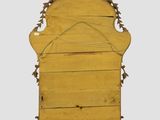 an old wooden dresser with a carved top and a wooden frame
